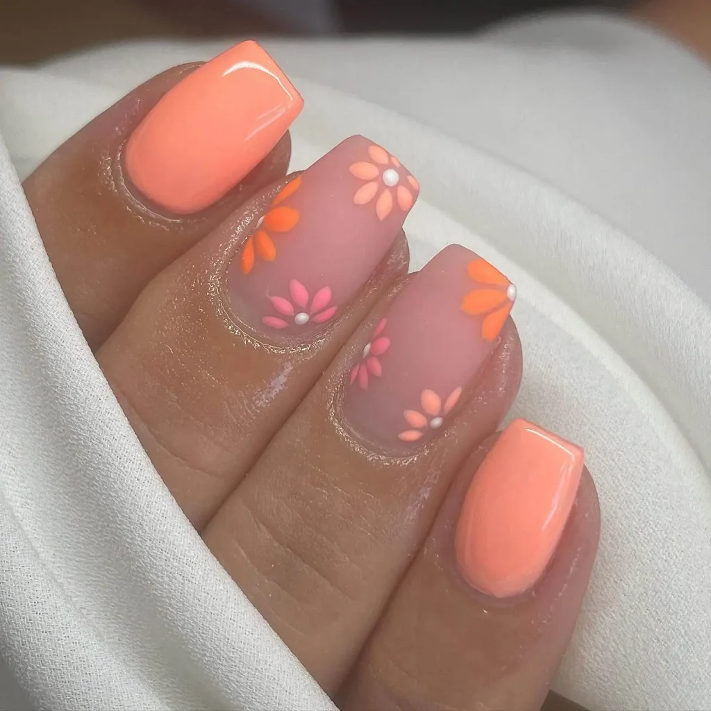 Coral peach nail design