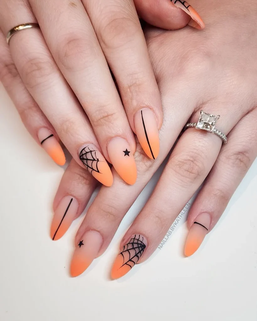 Halloween Nails with Spider Webs and Stars