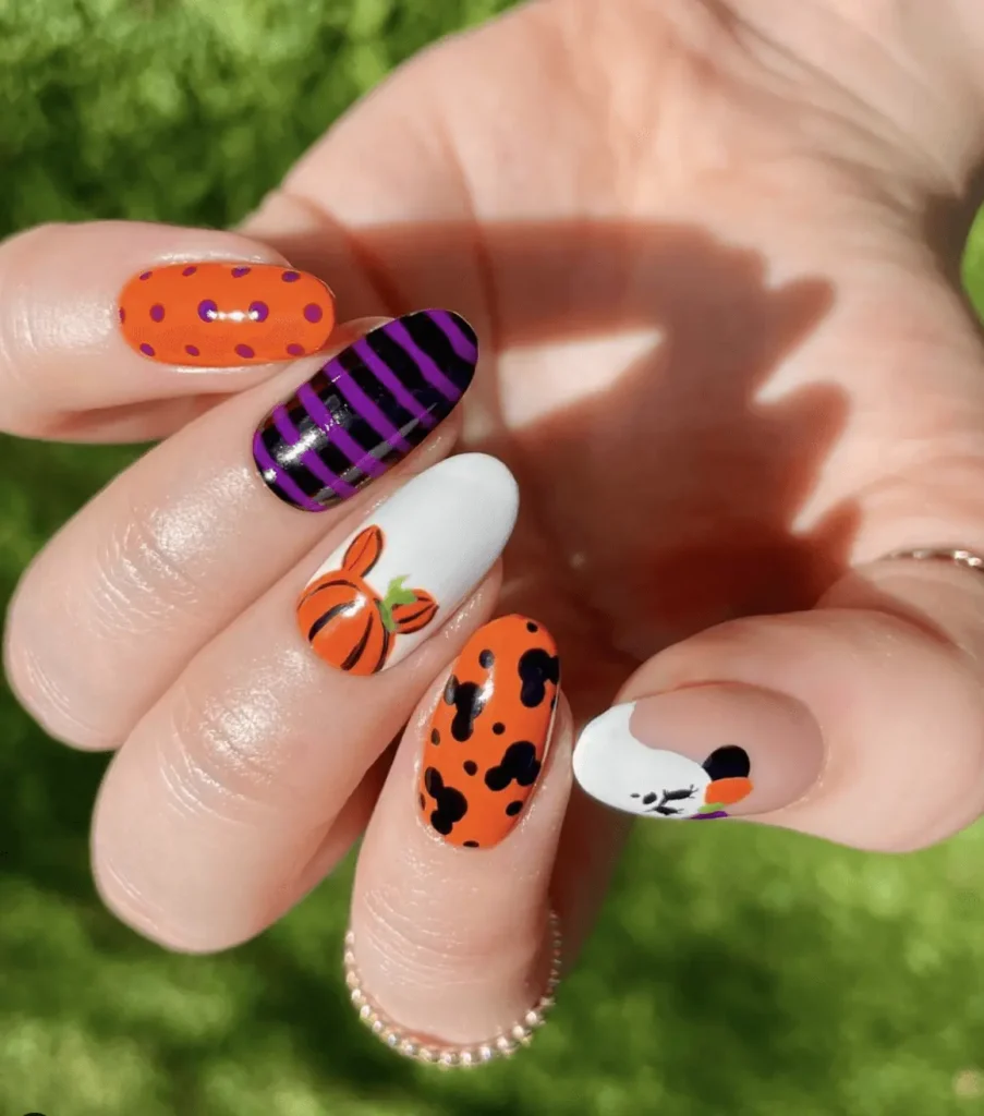 orange and purple halloween nails