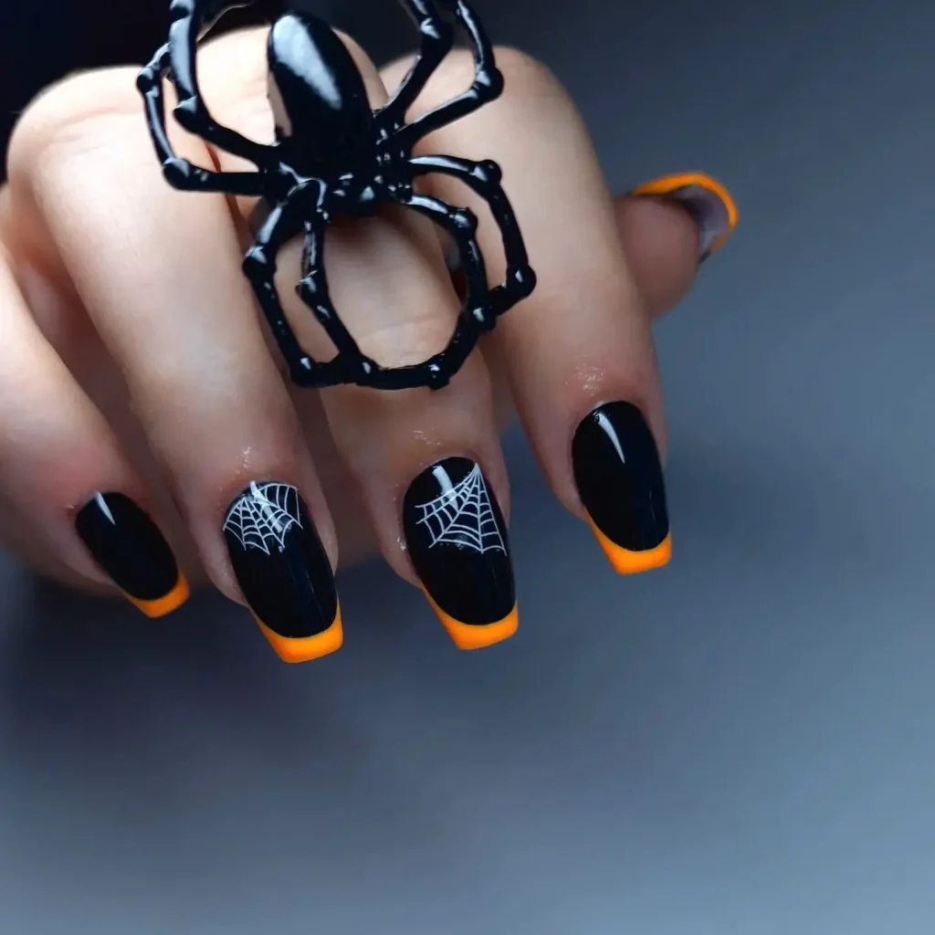 red and black spider nails design