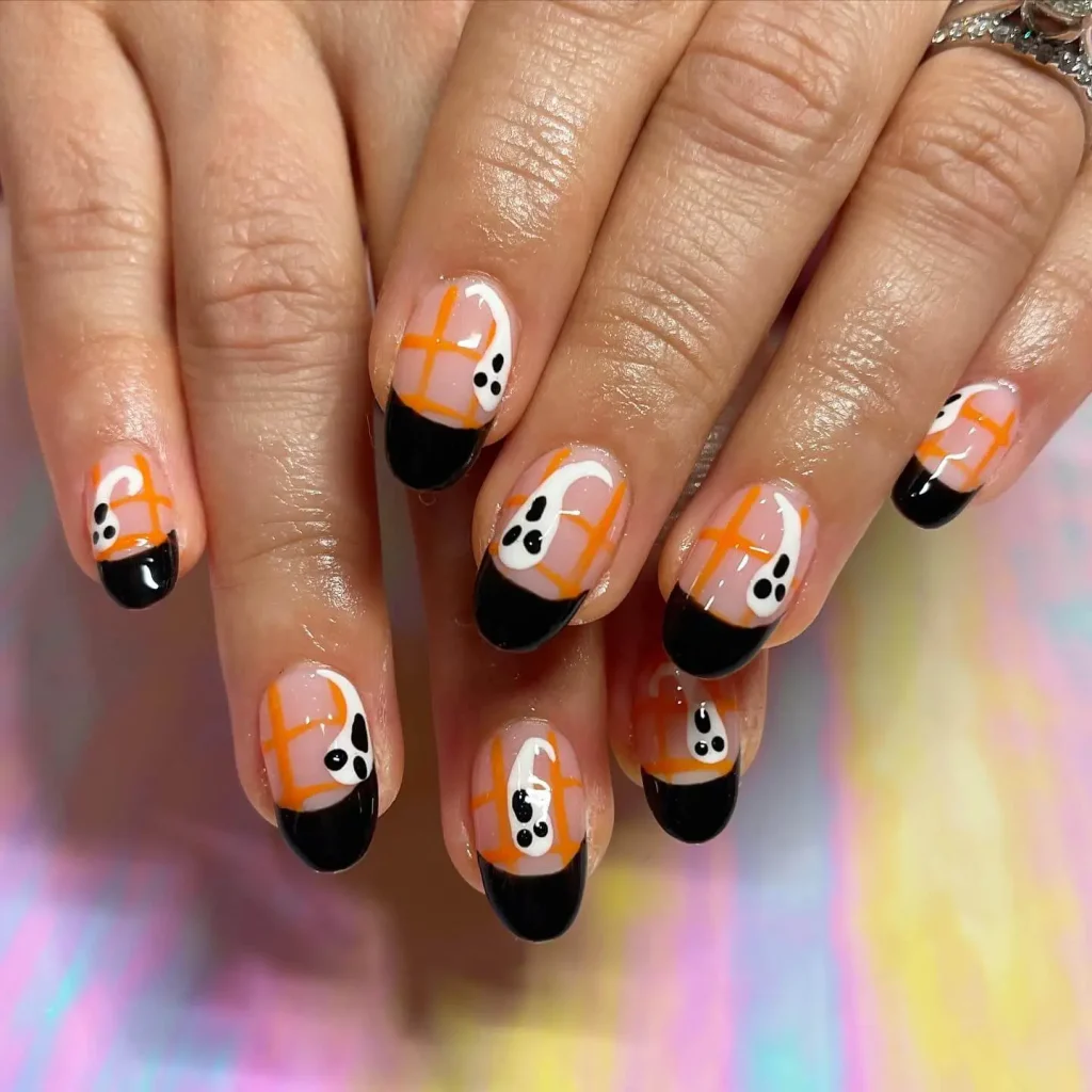 Orang and White Ghost Halloween Nail Design