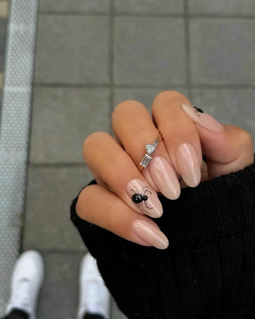 simple halloween black spider nail design